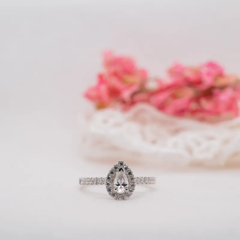 The Amaya Ring | Moissanite & Diamond Pear Cut Engagement Halo sold by Ethica Diamonds