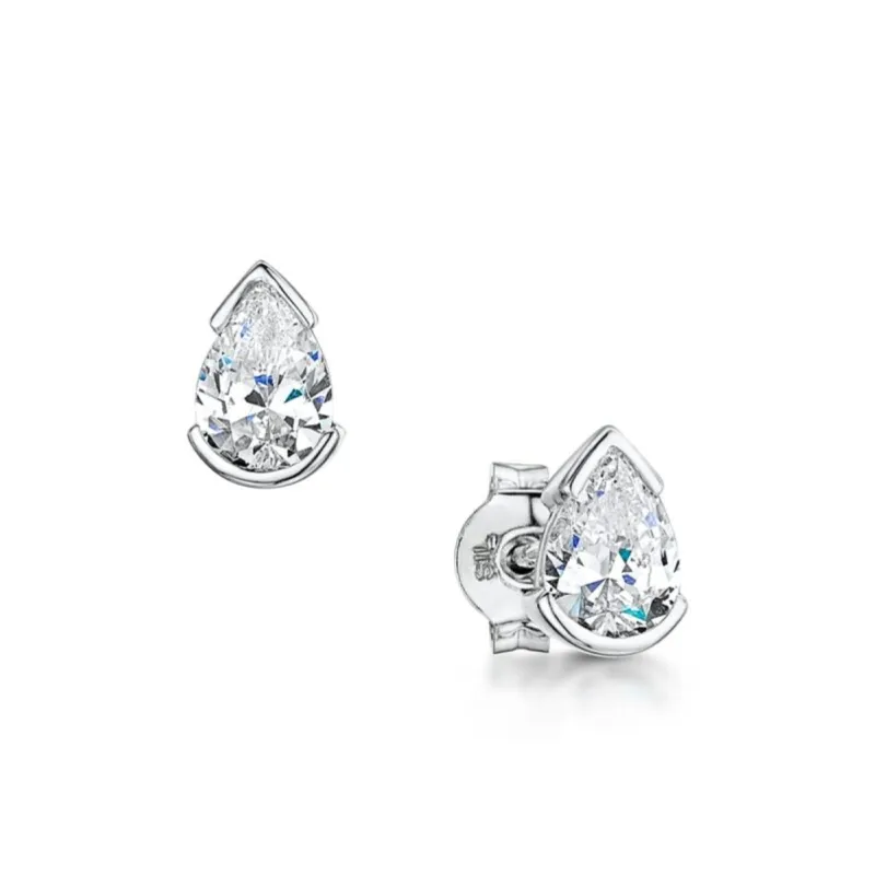 The Emelina Earrings | Pear Moissanite Bezel Solitaire Earrings sold by Ethica Diamonds