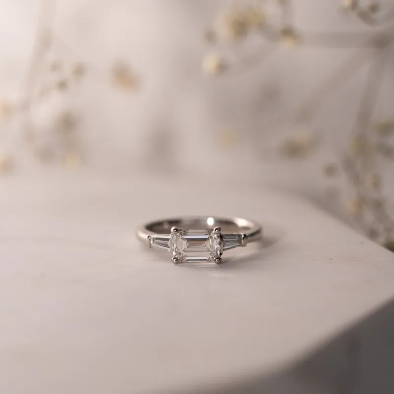 The Eden Ring | Emerald Lab Diamond Art Deco Engagement Trilogy sold by Ethica Diamonds