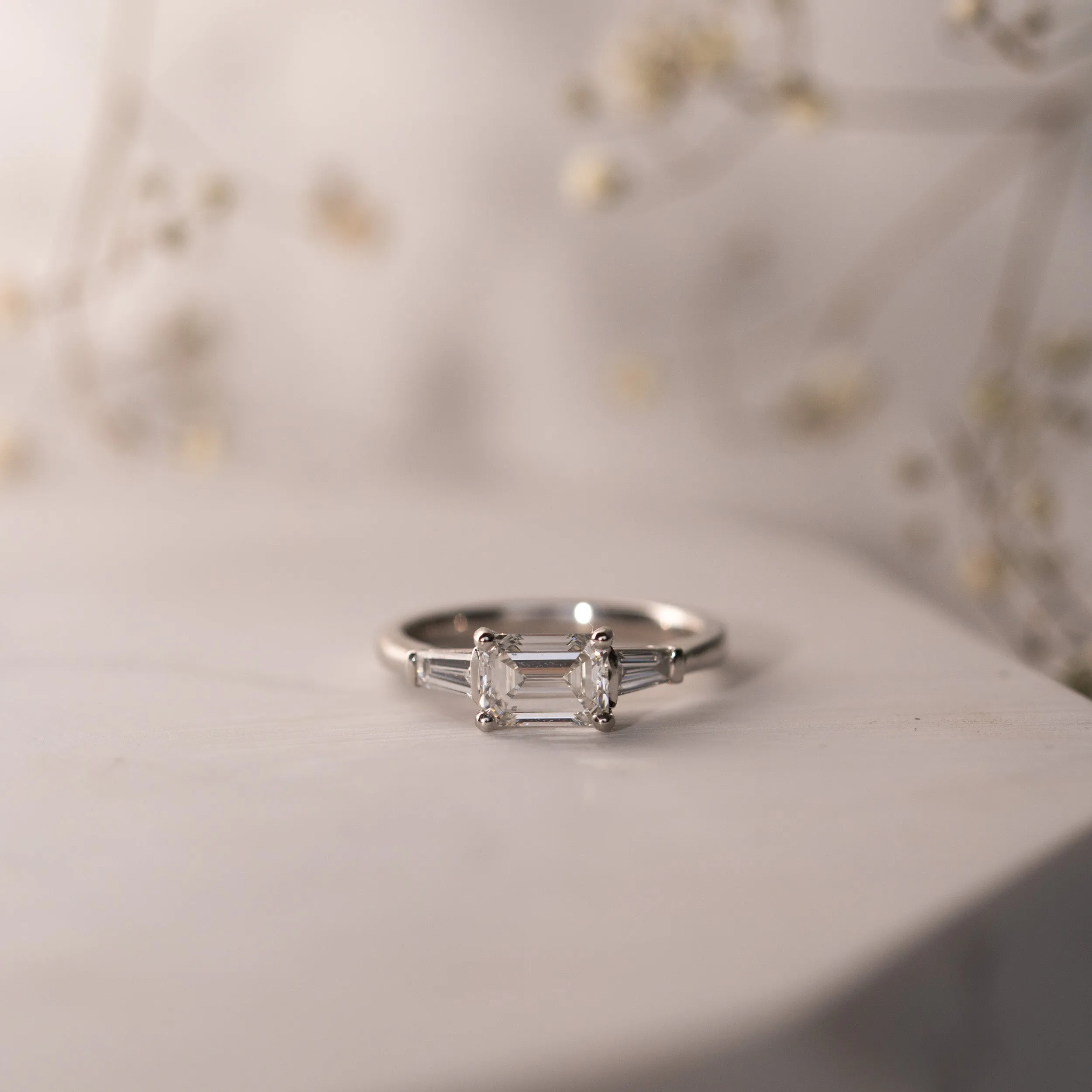 The Eden Ring | Emerald Lab Diamond Art Deco Engagement Trilogy sold by Ethica Diamonds