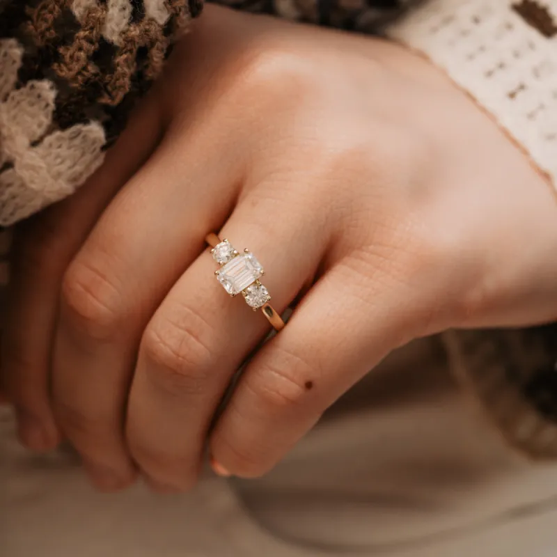 The Maya Ring | Emerald & Round Lab Diamond Engagement Trilogy sold by Ethica Diamonds