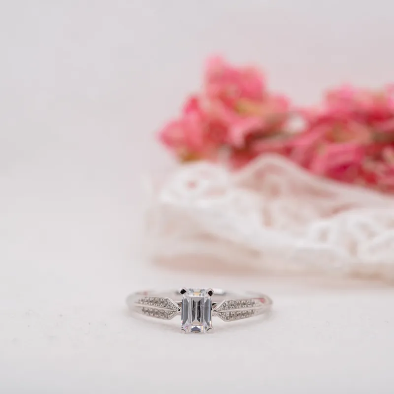 The Harper Ring | Moissanite & Diamond Vintage Emerald Cut Engagement sold by Ethica Diamonds