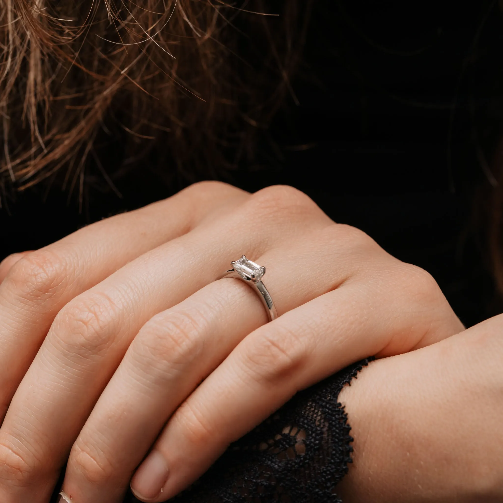 The Tia Ring | Emerald Cut Moissanite East West Engagement Solitaire sold by Ethica Diamonds product image thumbnail 5