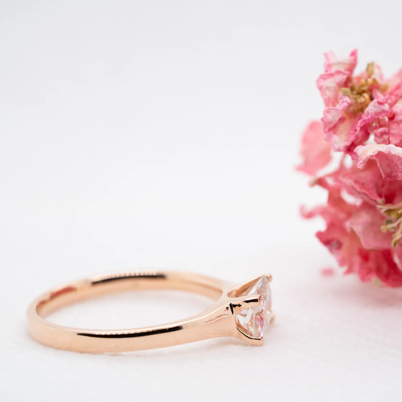 The Tia Ring | Emerald Cut Moissanite East West Engagement Solitaire sold by Ethica Diamonds product image thumbnail 3