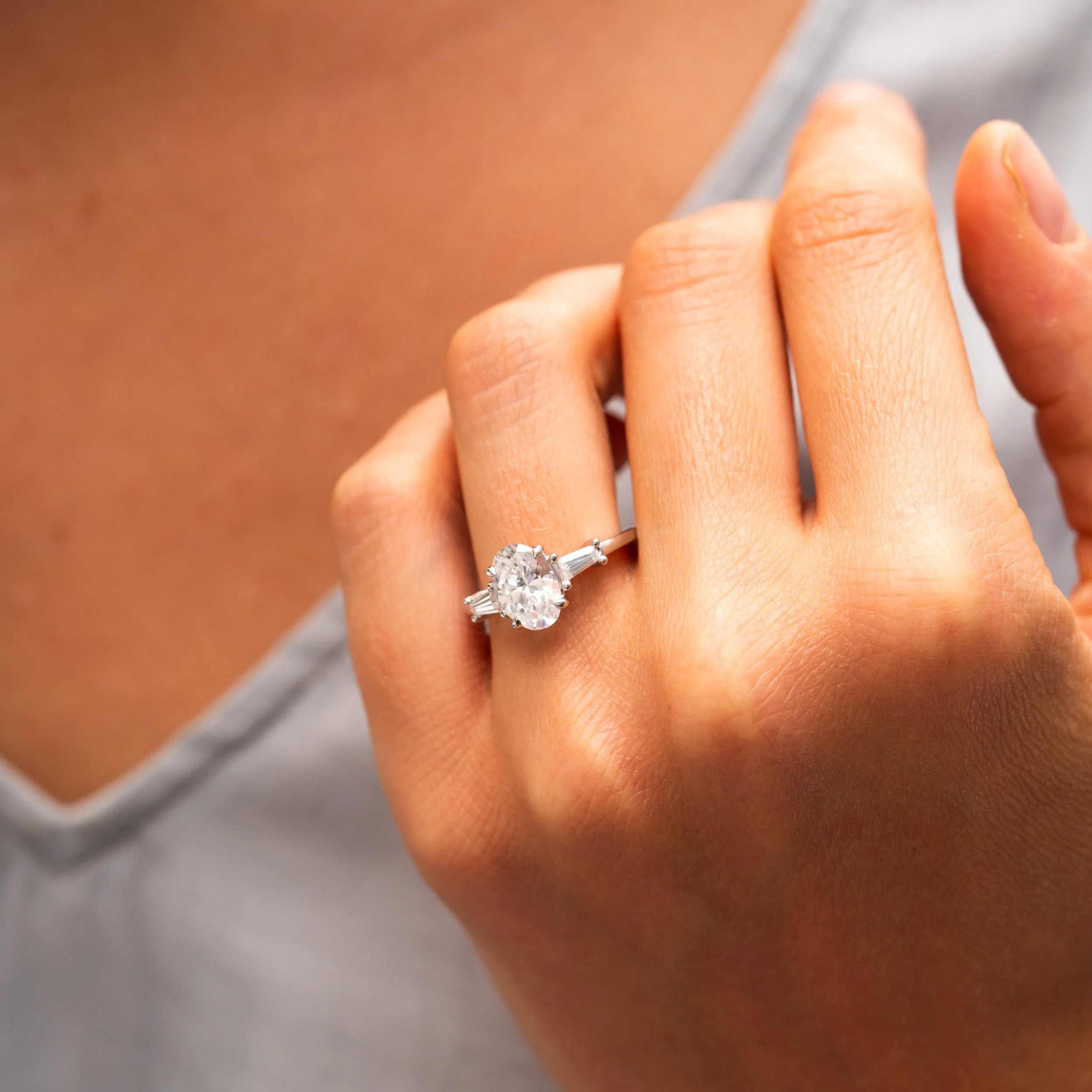 The Aurora | Lab Diamond Oval & Tapered Baguette Cut Engagement Trilogy Ring sold by Ethica Diamonds product image thumbnail 2