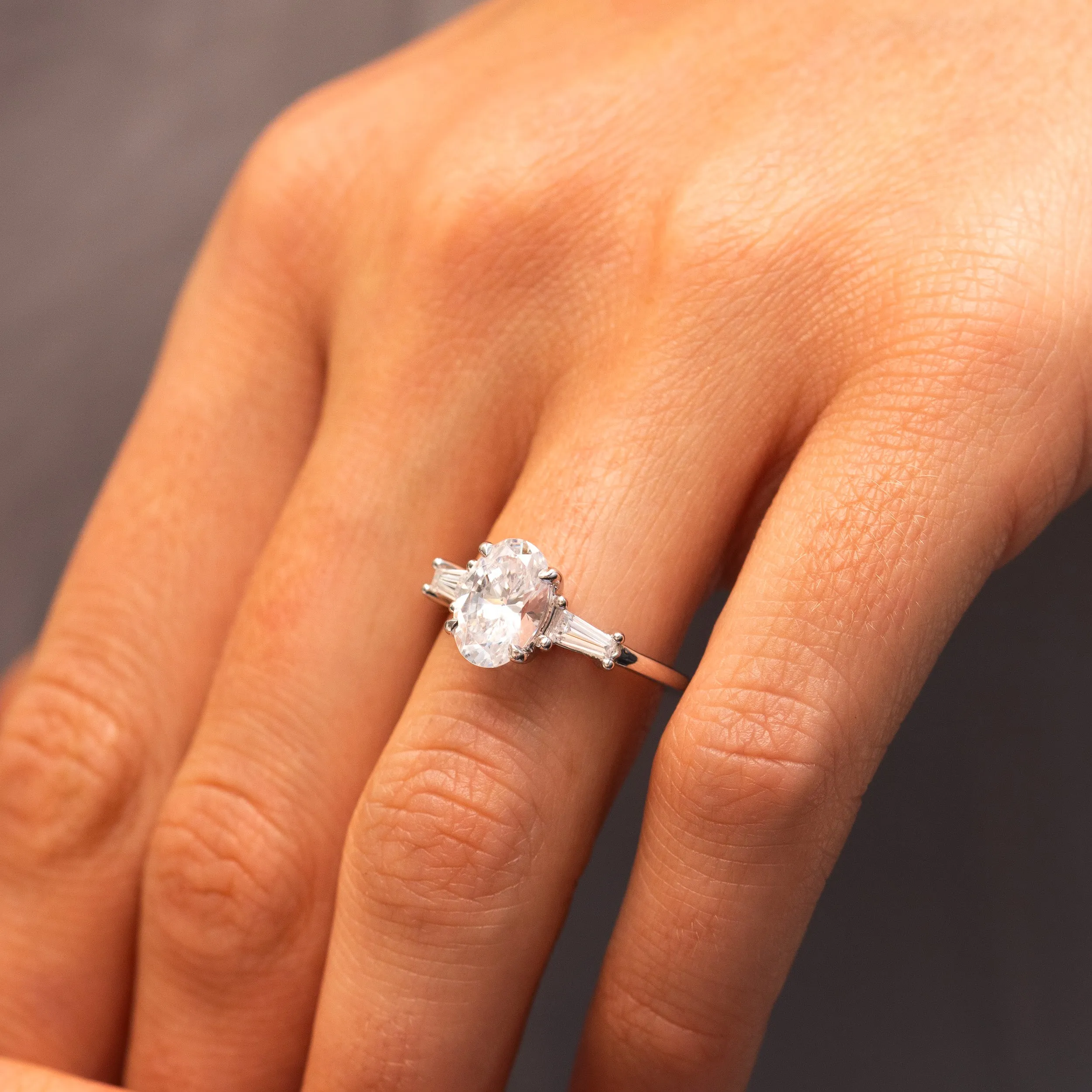 The Aurora | Lab Diamond Oval & Tapered Baguette Cut Engagement Trilogy Ring sold by Ethica Diamonds product image thumbnail 4