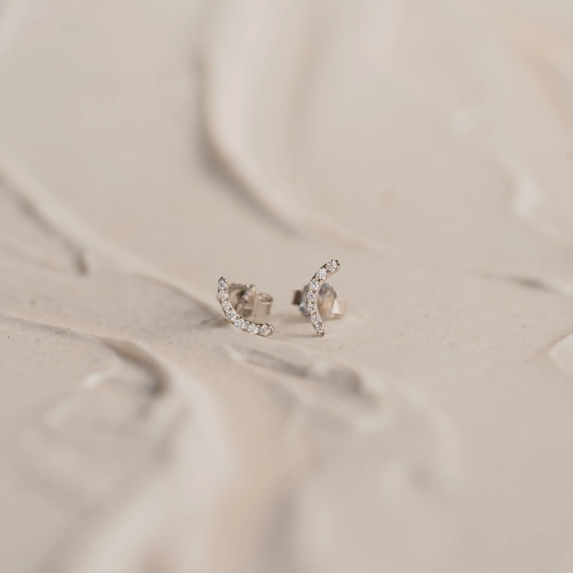The Mia | Delicate Curve Diamond Stud Earrings sold by Ethica Diamonds product image thumbnail 4