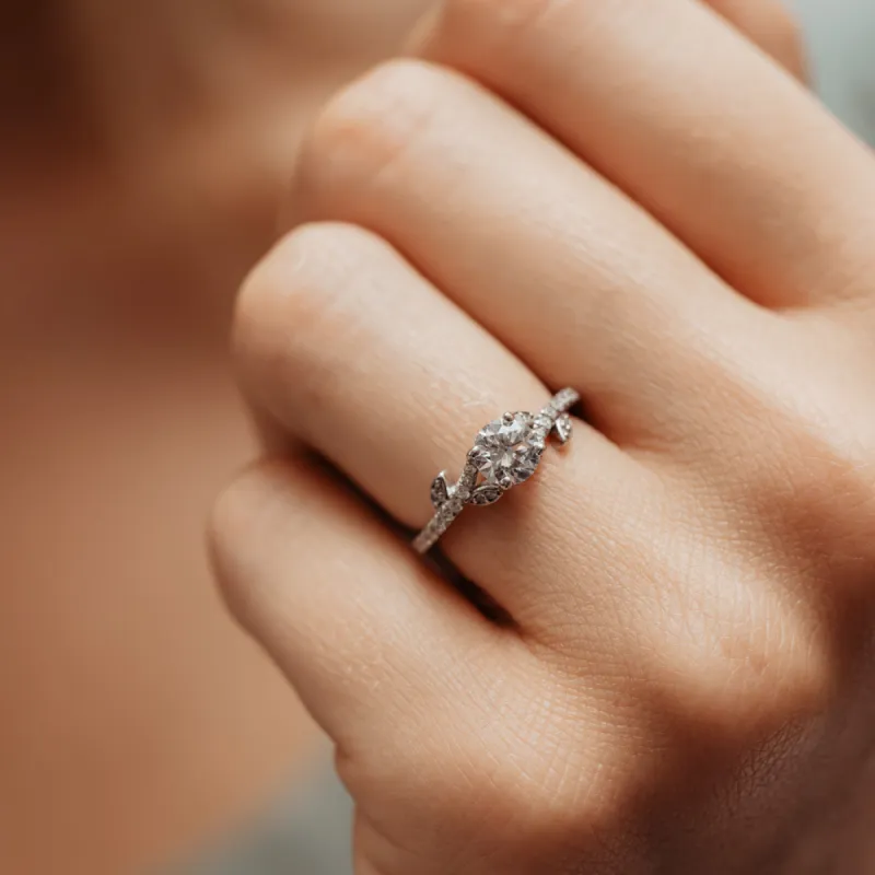 The Azahara Ring | Round Lab Diamond Accented Leaf Vine Engagement sold by Ethica Diamonds