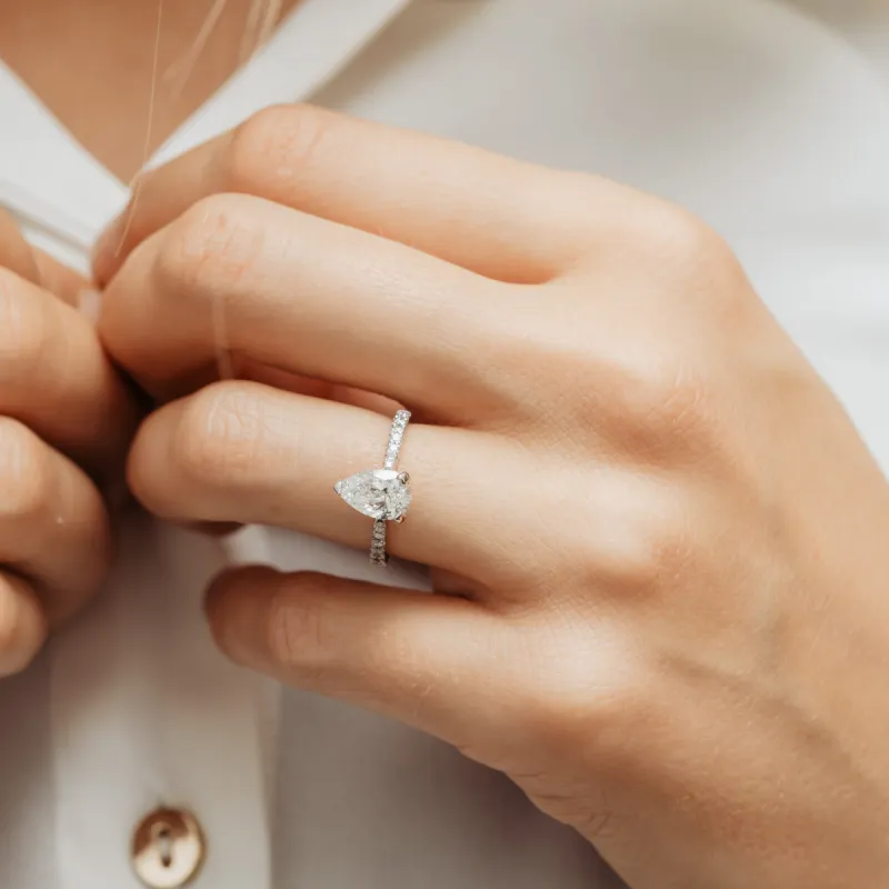 The Nouveau Ring | Moissanite & Diamond Pear Cut Shoulder Set Engagement sold by Ethica Diamonds