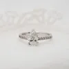 The Nouveau Ring | Moissanite & Diamond Pear Cut Shoulder Set Engagement sold by Ethica Diamonds