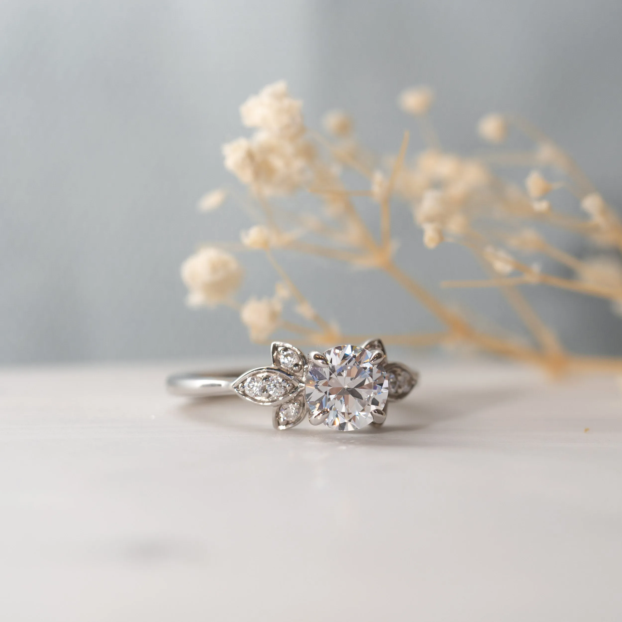 The Vani Ring | Round Moissanite & Diamond Nature Accented Engagement sold by Ethica Diamonds product image thumbnail 3