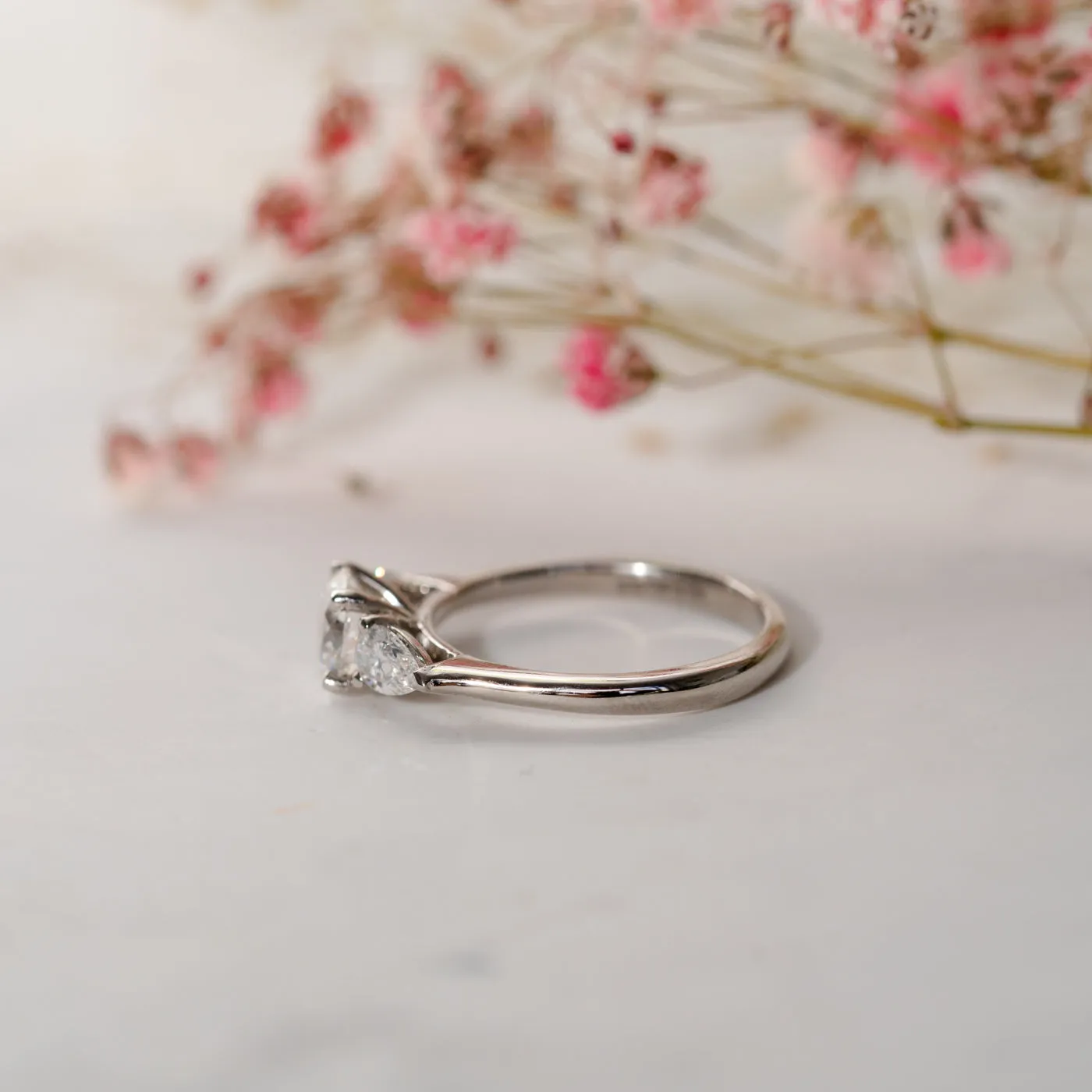 The Reverie Ring | Moissanite Round & Pear Cut Engagement Trilogy sold by Ethica Diamonds product image thumbnail 4