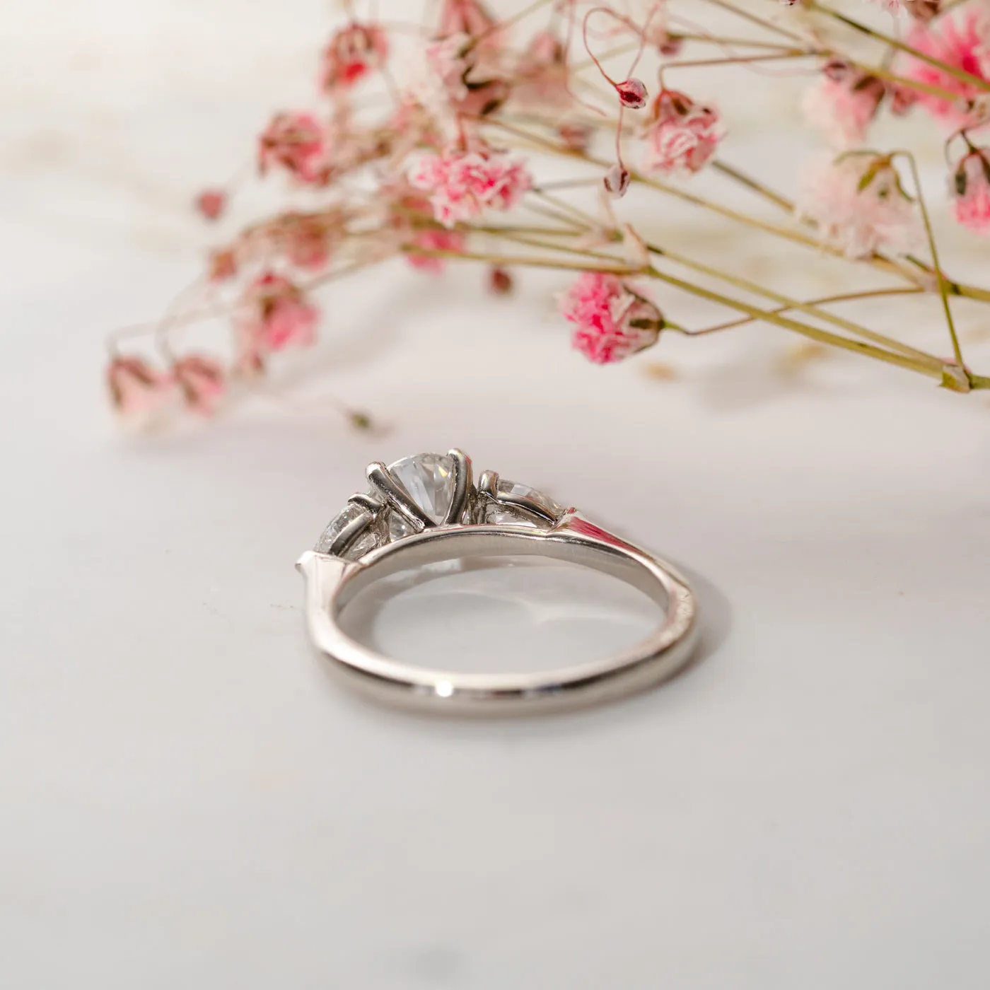 The Reverie Ring | Moissanite Round & Pear Cut Engagement Trilogy sold by Ethica Diamonds product image thumbnail 5
