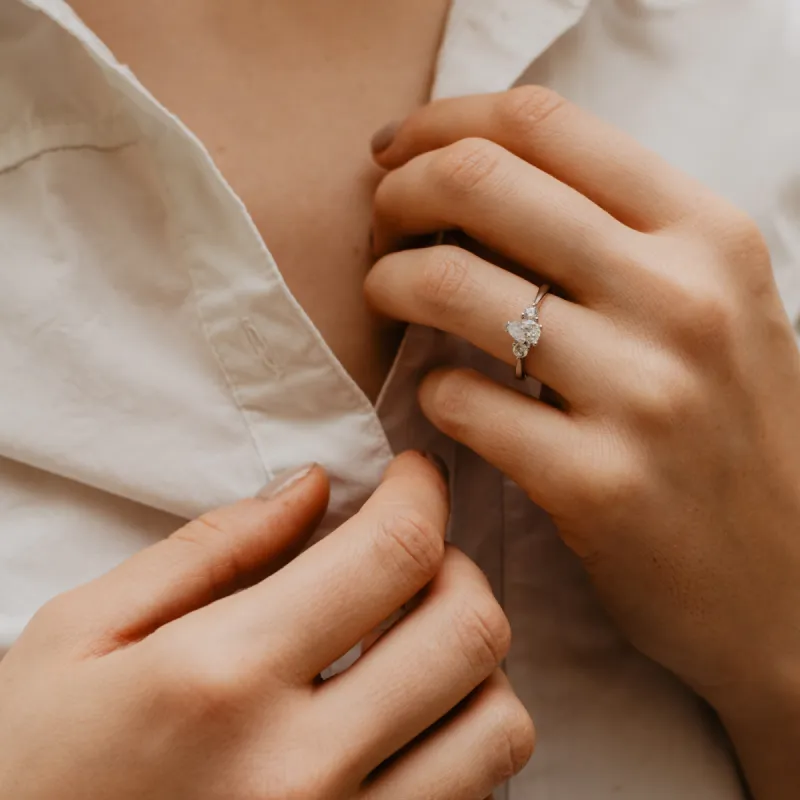 The Mila Ring | Moissanite Pear & Round Cut Engagement Trilogy sold by Ethica Diamonds