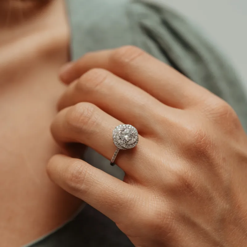 The Leyna Ring | Moissanite & Diamond Floral Statement Engagement Halo sold by Ethica Diamonds
