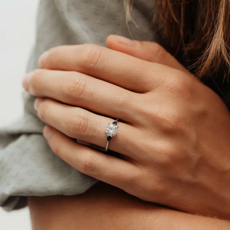 The Mei Ring | Moissanite Round & Pear Engagement Trilogy sold by Ethica Diamonds