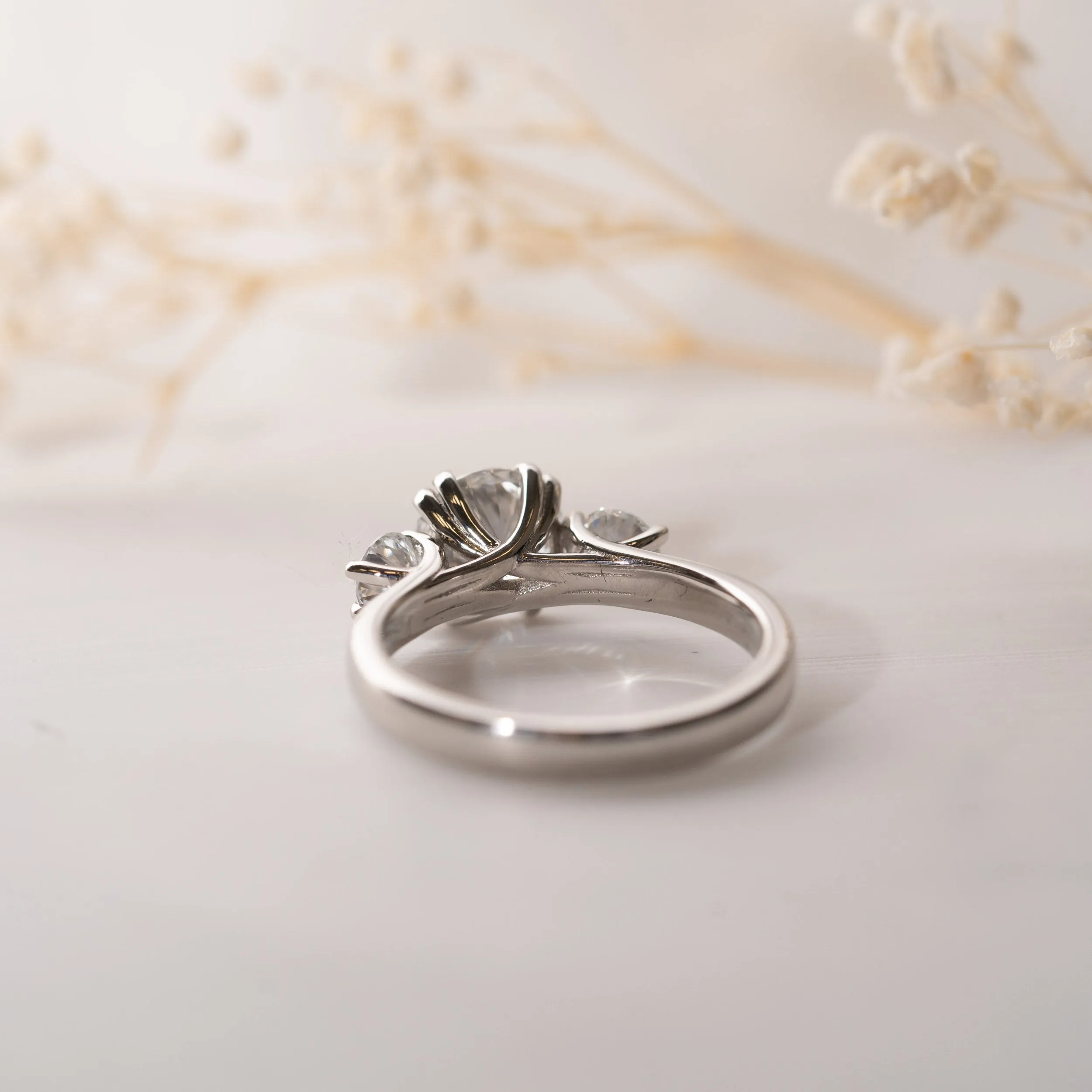 The Amorette Ring | Moissanite Round Split Claw Trilogy Engagement sold by Ethica Diamonds product image thumbnail 4