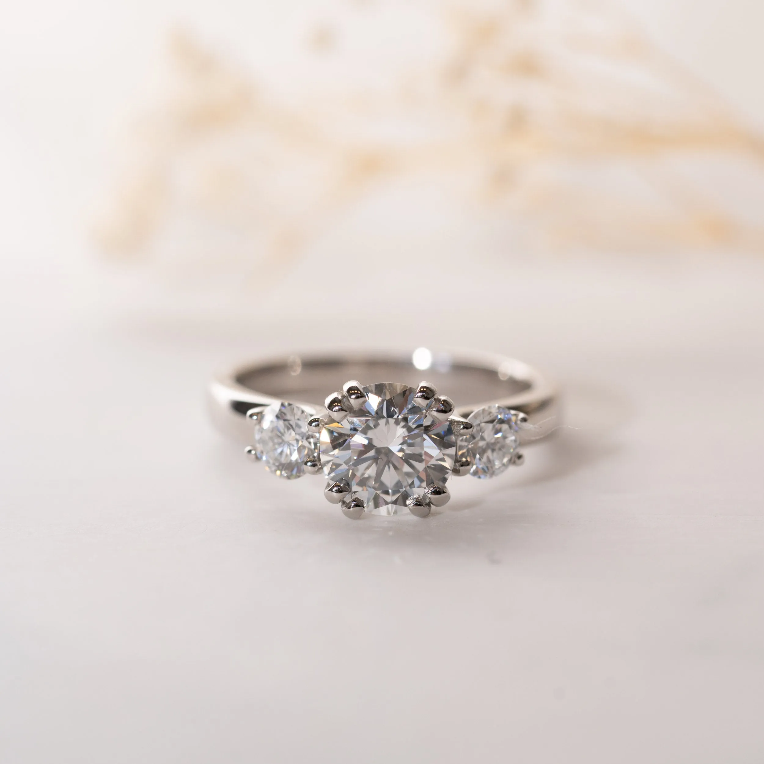The Amorette Ring | Moissanite Round Split Claw Trilogy Engagement sold by Ethica Diamonds product image thumbnail 3