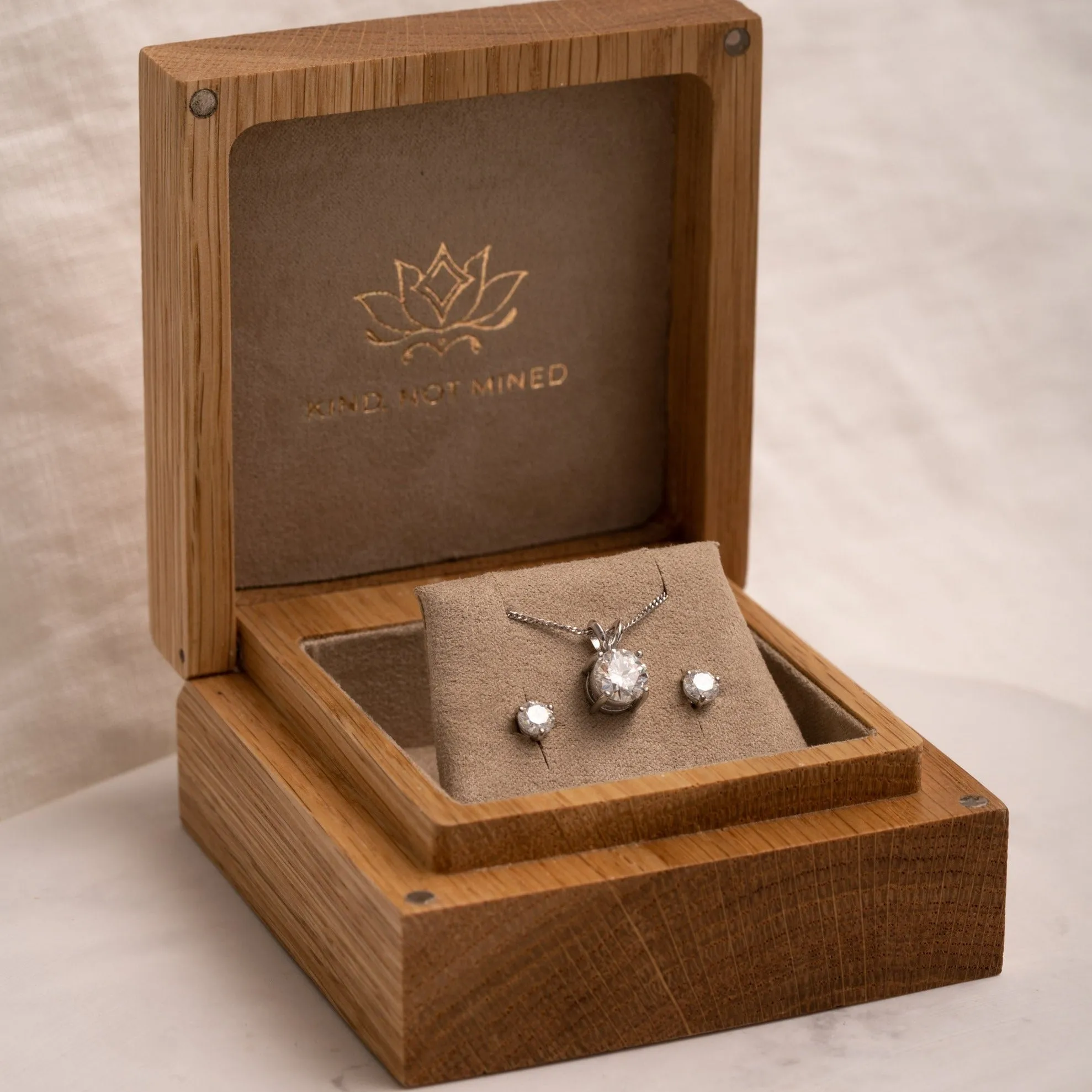 The Martini Earrings | Round Moissanite Three Claw Solitaire Studs sold by Ethica Diamonds product image thumbnail 2