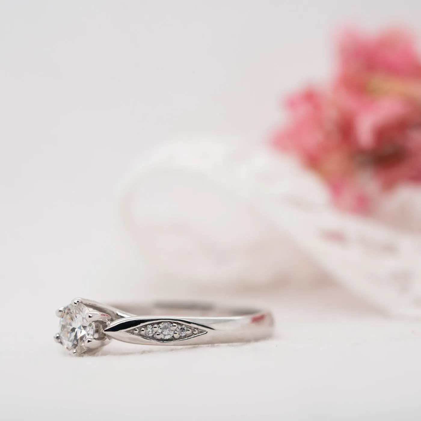 The Celia Ring | Round Lab Diamond Six Prong Accented Engagement sold by Ethica Diamonds product image thumbnail 3