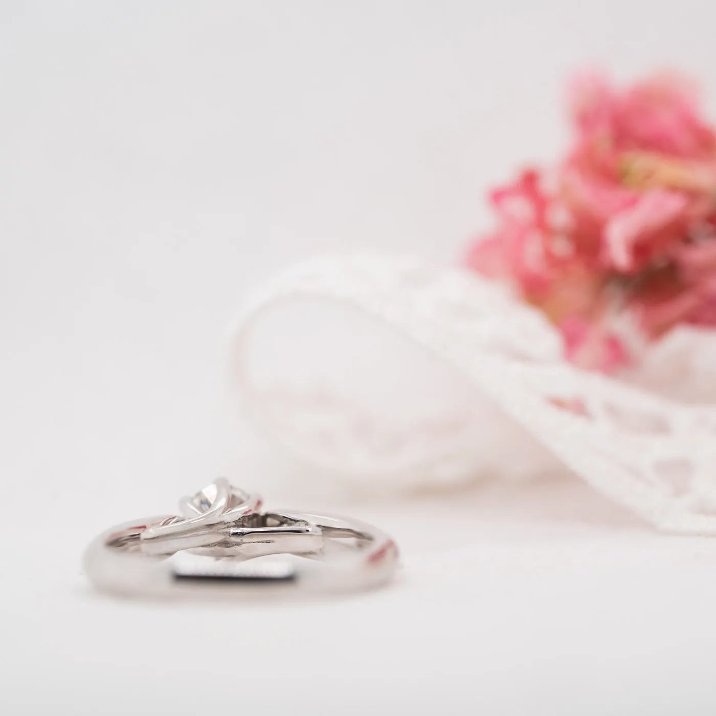 The Celia Ring | Round Lab Diamond Six Prong Accented Engagement sold by Ethica Diamonds product image thumbnail 4