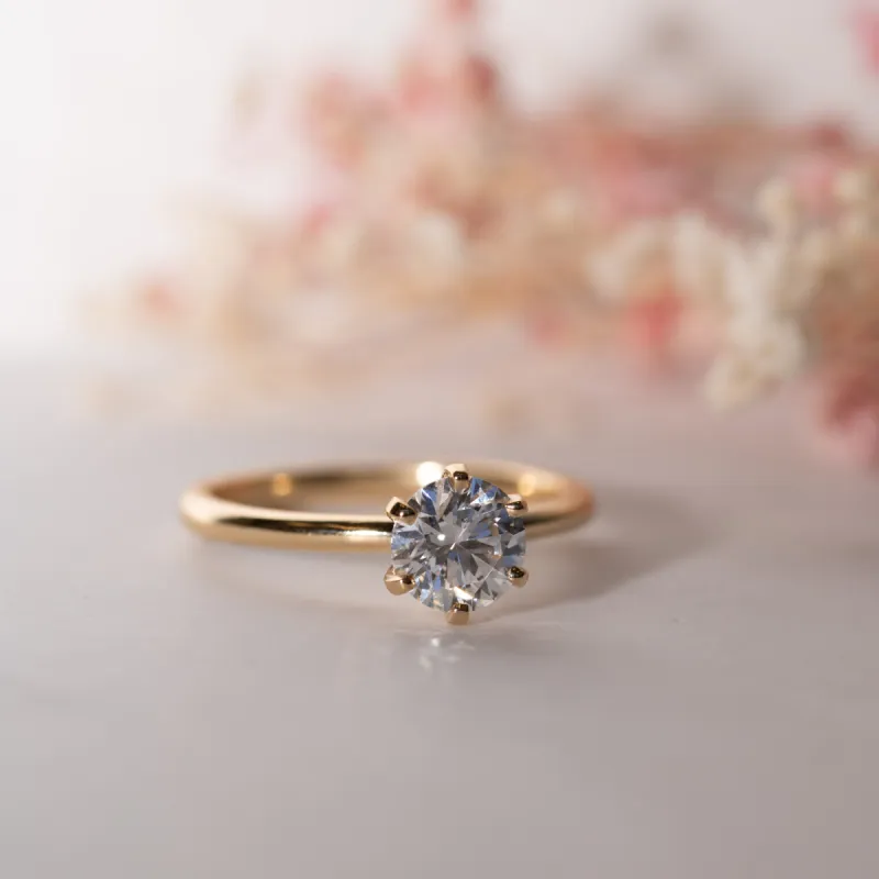 The Cyra Ring | Round Moissanite Tiffany Engagement Solitaire sold by Ethica Diamonds