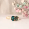 The Mira Ring | 2.02ct Chatham® Oval Paraíba Spinel & Seafoam Moissanite Toi et Moi sold by Ethica Diamonds