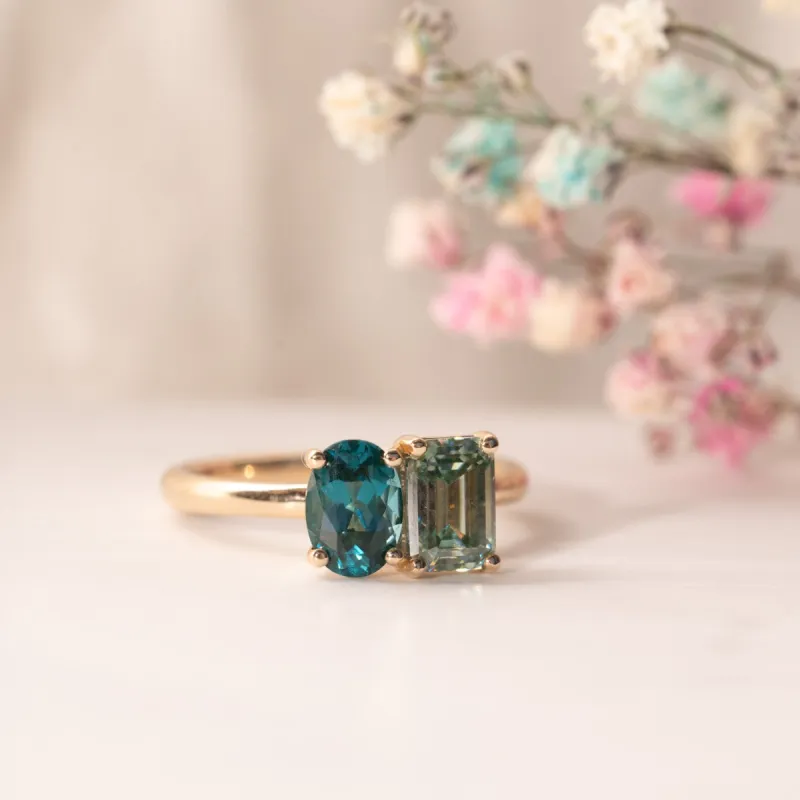 The Mira Ring | 2.02ct Chatham® Oval Paraíba Spinel & Seafoam Moissanite Toi et Moi sold by Ethica Diamonds