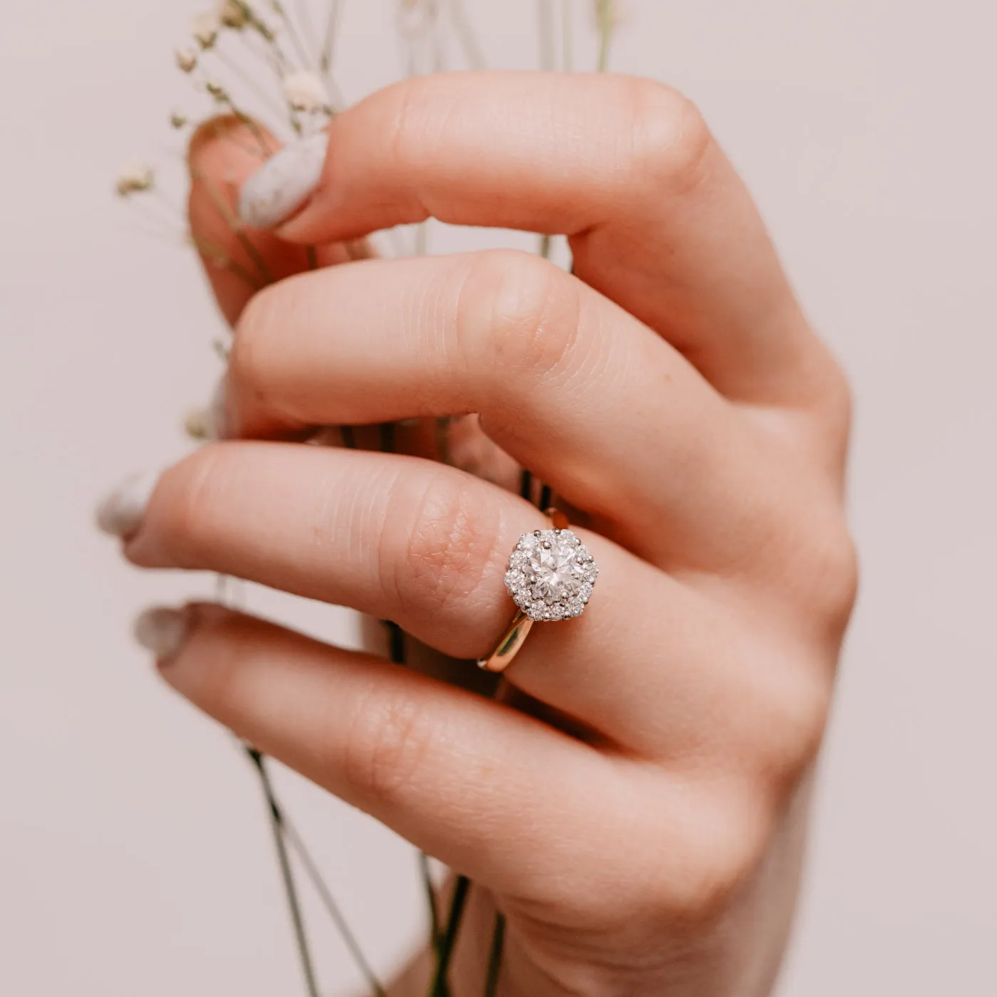 The Dahlia Ring | Moissanite & Diamond Hexagonal Engagement Halo sold by Ethica Diamonds