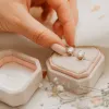 The Calia Earrings | Moissanite Solitaire Oval Basket Studs sold by Ethica Diamonds