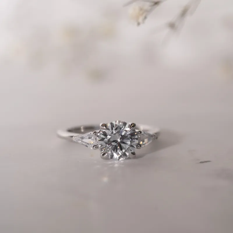 The Miranda | Nature Inspired Round Brilliant & Shield Cut Trilogy Engagement Ring sold by Ethica Diamonds