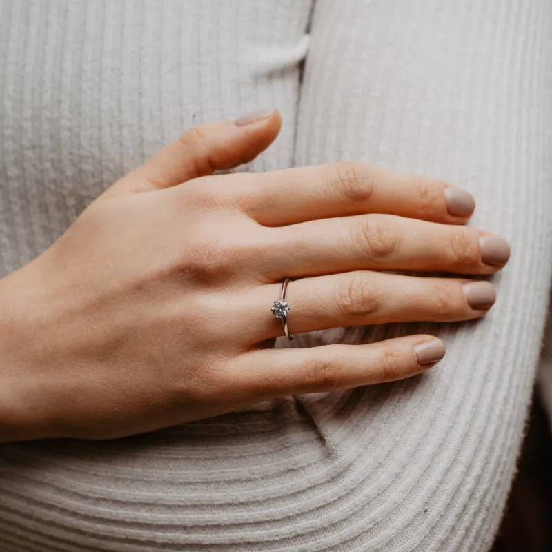 The Nola Ring | Round Moissanite Tiffany Engagement Slim Solitaire sold by Ethica Diamonds