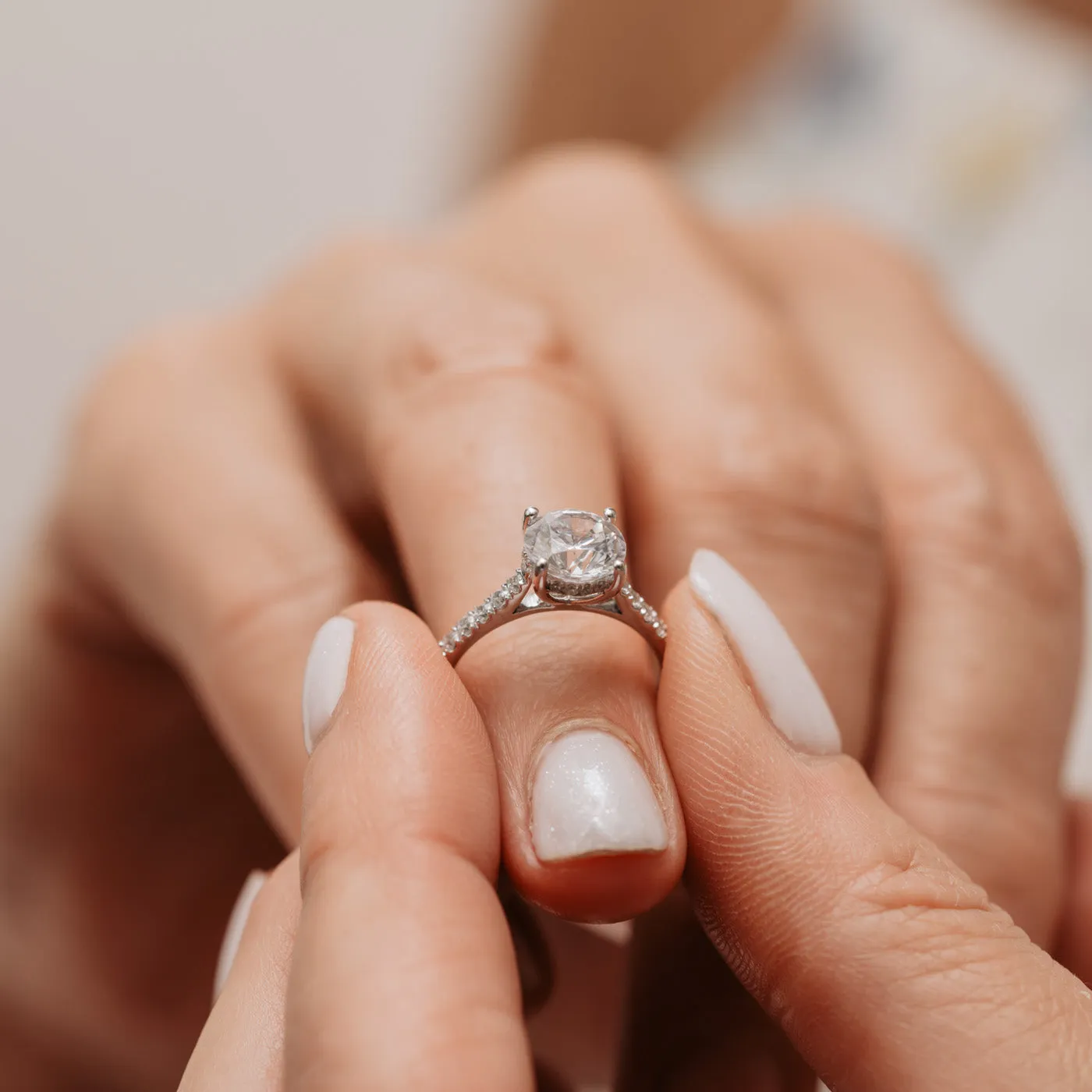 The Anabel Ring | Moissanite & Diamond Shoulder Set Hidden Halo Engagement sold by Ethica Diamonds