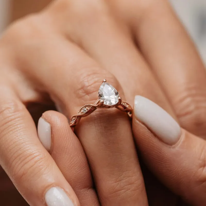 The Marcia Ring | Moissanite & Diamond Pear Cut Shoulder Set Engagement sold by Ethica Diamonds