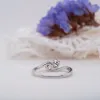 The Elysia Ring | Round Moissanite Toi Et Moi Wave Vintage Engagement sold by Ethica Diamonds