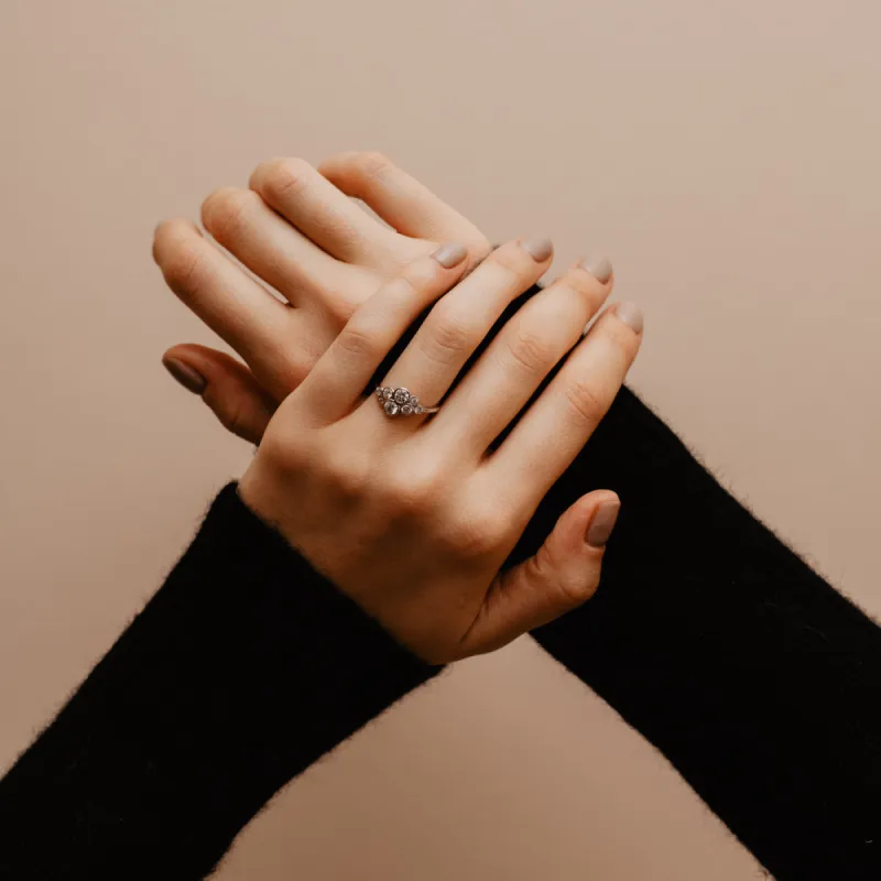 The Imogen Ring | Round Moissanite Modern Cluster Multistone sold by Ethica Diamonds