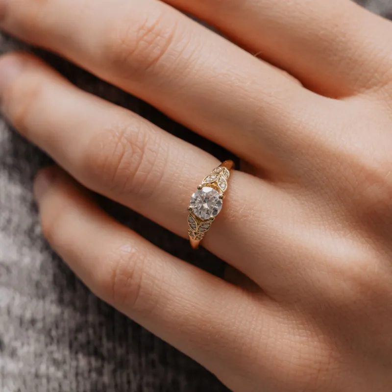 The Sabine Ring | Round Moissanite & Diamond Accented Vintage Engagement sold by Ethica Diamonds