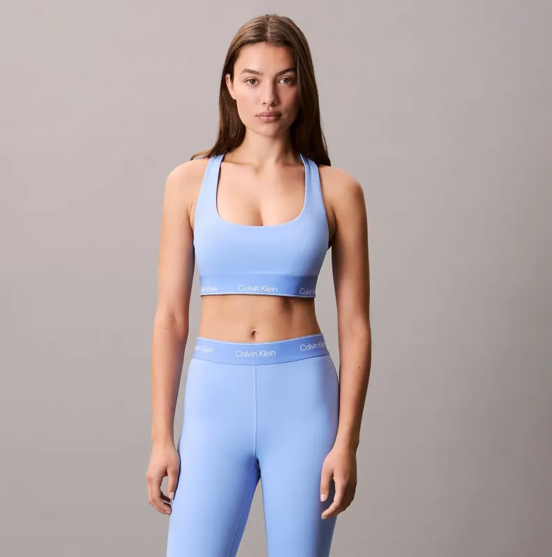 Calvin Klein Womens Quick-Dry Medium Impact Sports Bra Blue sold by House of Slippers