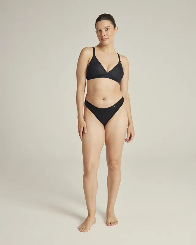 The Stretch Dipped Thong - Black sold by Nudea