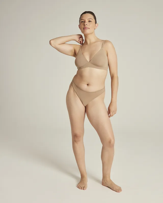 The Stretch Dipped Thong - Bare 03 sold by Nudea