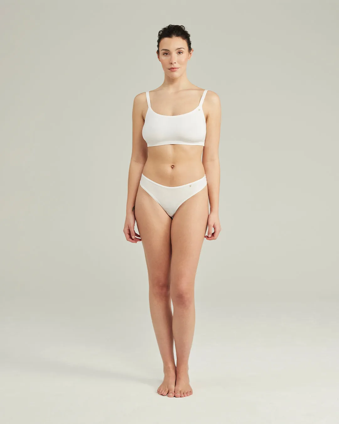 The Stretch Dipped Thong - Cotton White sold by Nudea