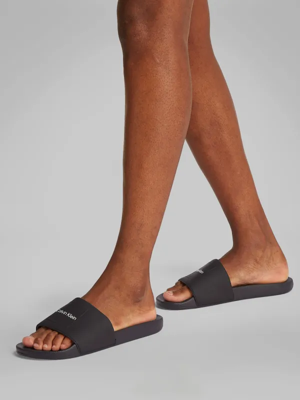 Calvin Klein POOL SLIDE W/ CK SQU Mens Sliders Black sold by Shuperb