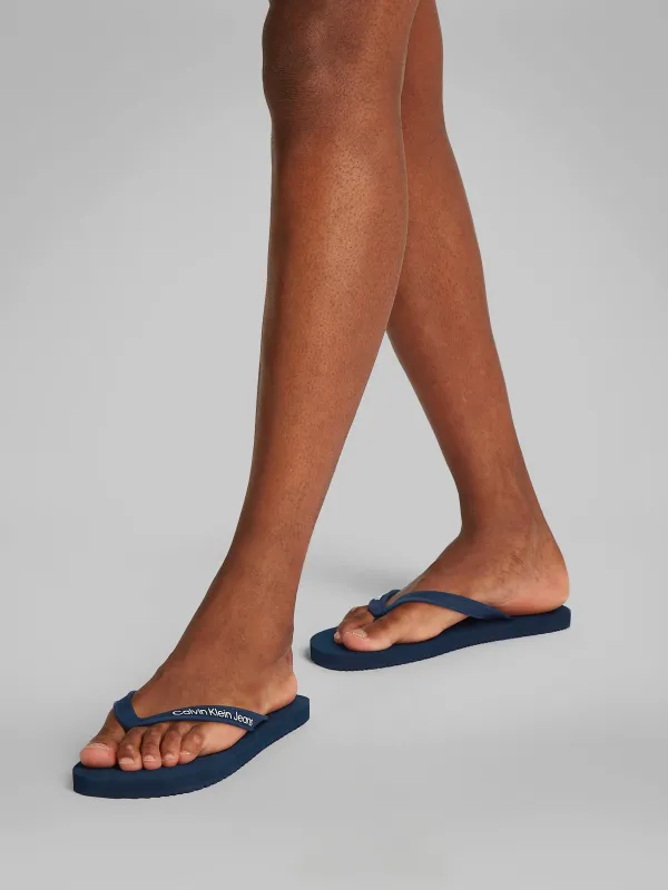 Calvin Klein BEACH SANDAL TRANSPA Mens Sandals Calvin Navy/Bright White sold by Shuperb