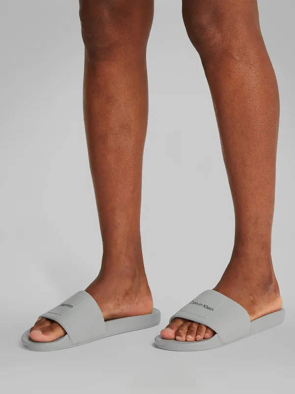 Calvin Klein POOL SLIDE W/ CK SQU Mens Sliders Granite Road sold by Shuperb