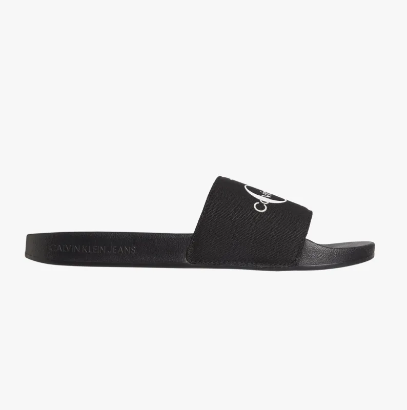Calvin Klein SLIDE MONOGRAM Mens Flip Flops Black/Bright White sold by Shuperb