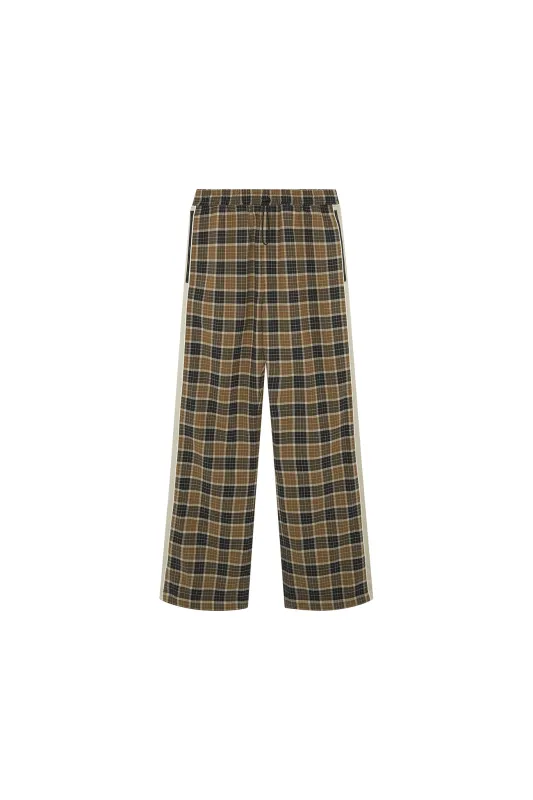 Akin track pants sold by Ahluwalia