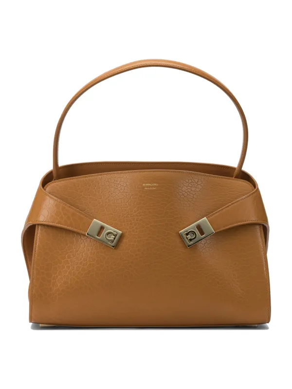 Handbags Orange made by Salvatore Ferragamo