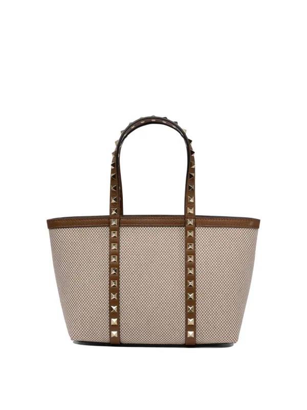 Rockstud Handbags Beige sold by Wanan Luxury