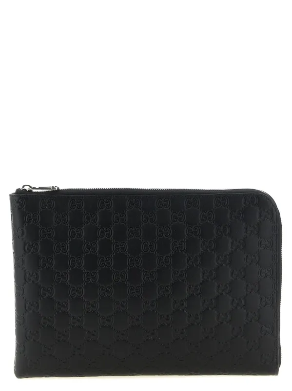 Gg Emblem Clutch Black sold by Wanan Luxury