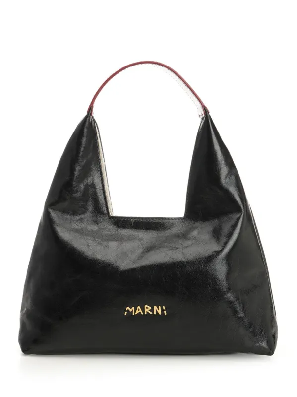 Trapeze Handbags Black sold by Wanan Luxury